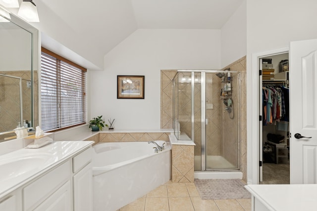 107 Barkley Dr, Hickory Creek, TX 75065 - full bath with vanity, tile patterned flooring, a garden tub, a shower stall, and a spacious closet