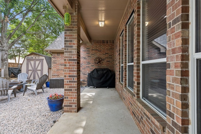 107 Barkley Dr, Hickory Creek, TX 75065 - view of patio with a storage unit