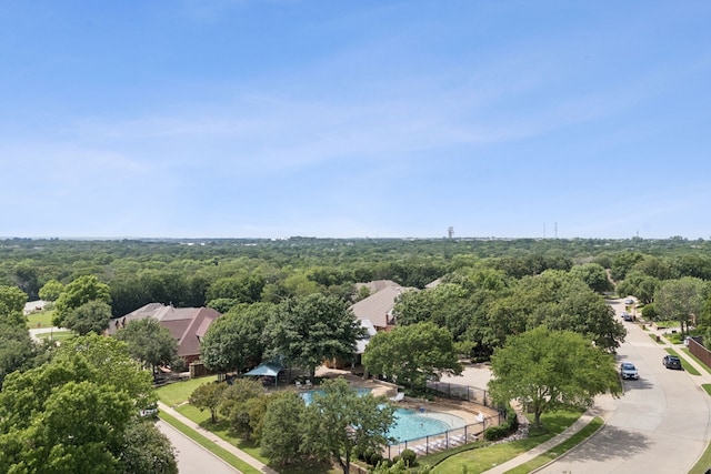 107 Barkley Dr, Hickory Creek, TX 75065 - drone / aerial view of a forest and a pool area