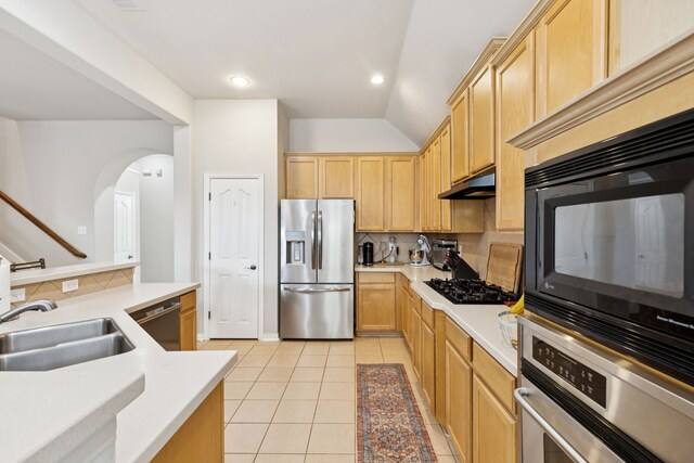 107 Barkley Dr, Hickory Creek, TX 75065 - kitchen with black appliances, backsplash, light brown cabinetry, recessed lighting, and vaulted ceiling