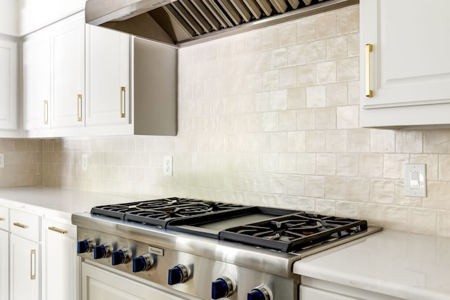 2020 Winding Hollow Ln, Plano, TX 75093 - kitchen featuring custom exhaust hood, stainless steel gas stovetop, white cabinets, light countertops, and decorative backsplash