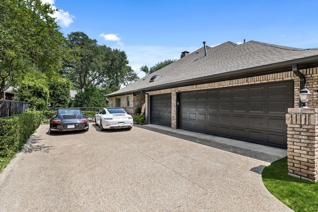 2020 Winding Hollow Ln, Plano, TX 75093 - view of side of home featuring roof with shingles, asphalt driveway, and brick siding