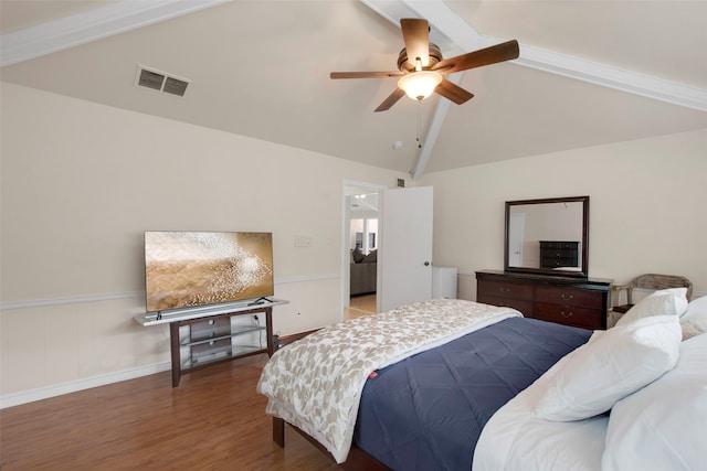 9718 Burney Dr, Dallas, TX 75243 - bedroom featuring beam ceiling, wood finished floors, a ceiling fan, and high vaulted ceiling