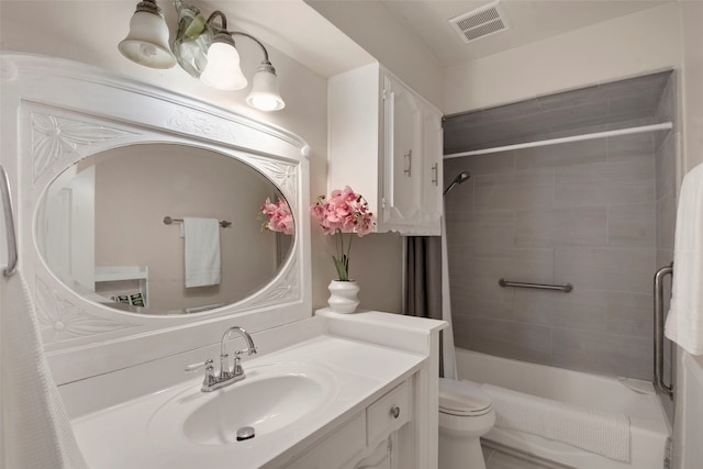 9718 Burney Dr, Dallas, TX 75243 - full bathroom featuring vanity, toilet, and bathtub / shower combination