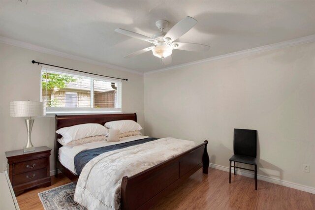 9718 Burney Dr, Dallas, TX 75243 - bedroom with light wood-type flooring, crown molding, baseboards, and a ceiling fan
