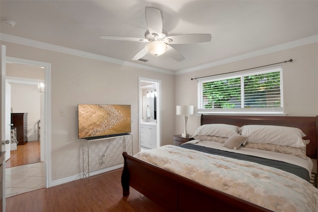 9718 Burney Dr, Dallas, TX 75243 - bedroom with wood finished floors, ornamental molding, a ceiling fan, ensuite bath, and baseboards