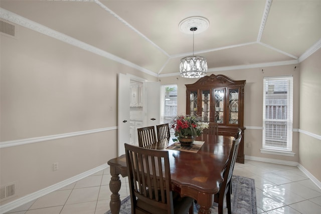 9718 Burney Dr, Dallas, TX 75243 - dining space featuring light tile patterned flooring, a chandelier, vaulted ceiling, and baseboards