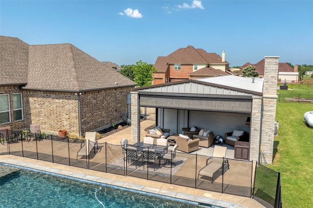 2113 Twin Creeks Cir, Pilot Point, TX 76258 - rear view of house with brick siding, a patio area, an outdoor hangout area, and roof with shingles