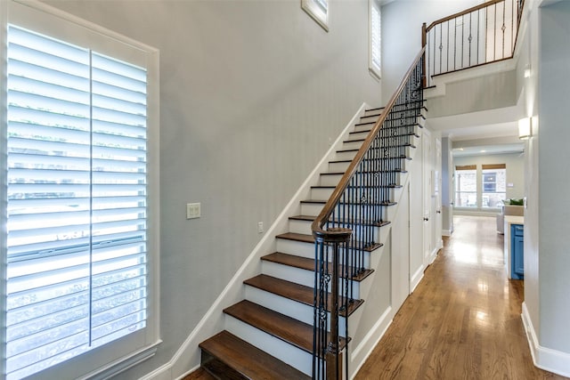 5152 Vickery Blvd, Dallas, TX 75206 - stairway featuring wood finished floors, baseboards, and a high ceiling