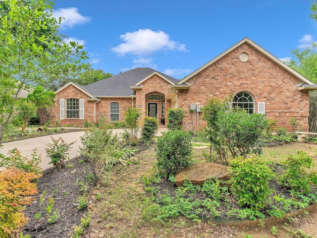 1536 Valley Creek Rd, Denton, TX 76205 - view of front of house featuring brick siding and roof with shingles