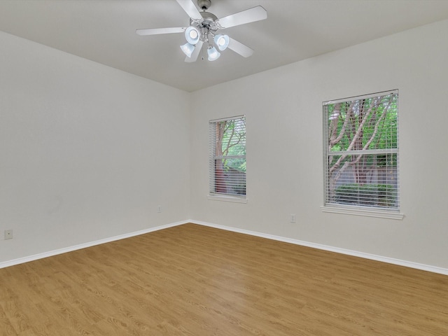 1536 Valley Creek Rd, Denton, TX 76205 - empty room featuring light wood-style floors and a ceiling fan