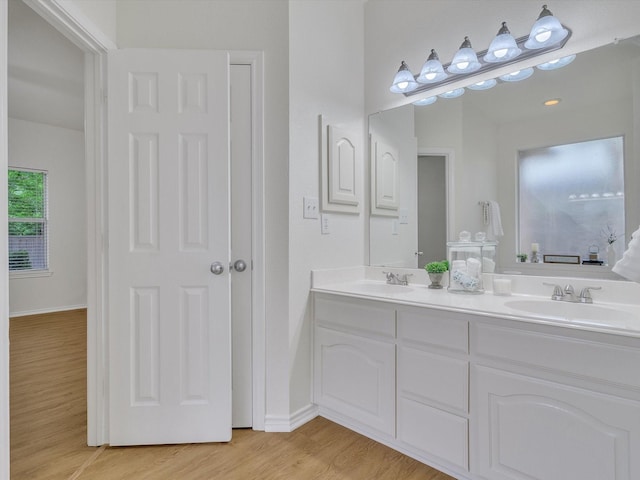 1536 Valley Creek Rd, Denton, TX 76205 - full bath with double vanity and wood finished floors