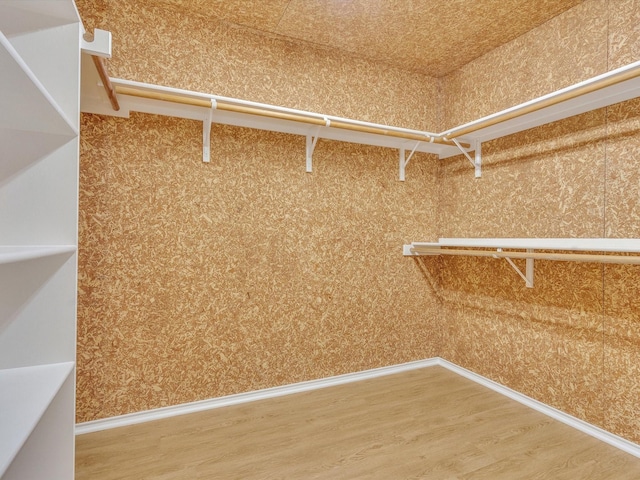 1536 Valley Creek Rd, Denton, TX 76205 - walk in closet with wood finished floors