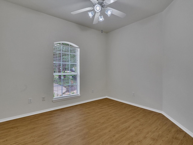 1536 Valley Creek Rd, Denton, TX 76205 - spare room with wood finished floors and ceiling fan