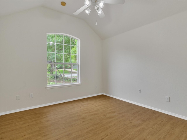 1536 Valley Creek Rd, Denton, TX 76205 - spare room with a ceiling fan, wood finished floors, and lofted ceiling