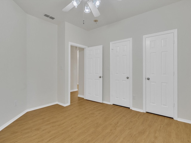 1536 Valley Creek Rd, Denton, TX 76205 - unfurnished bedroom with light wood-style floors and ceiling fan