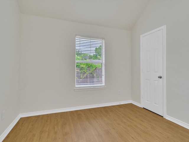 1536 Valley Creek Rd, Denton, TX 76205 - unfurnished room with light wood-style flooring and lofted ceiling
