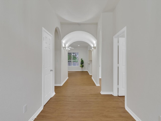 1536 Valley Creek Rd, Denton, TX 76205 - corridor featuring arched walkways and light wood-type flooring