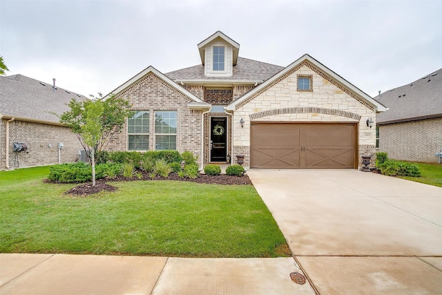 240 Gill Point Ln, Aledo, TX 76008 - french provincial home featuring a front yard, driveway, brick siding, and an attached garage