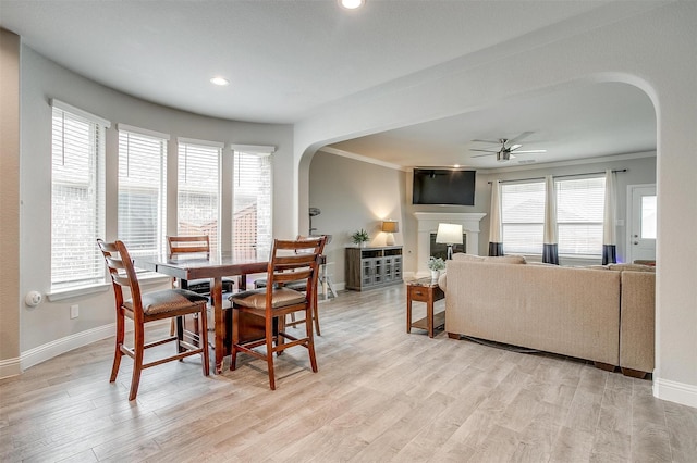 240 Gill Point Ln, Aledo, TX 76008 - dining space with arched walkways, baseboards, a ceiling fan, light wood finished floors, and recessed lighting