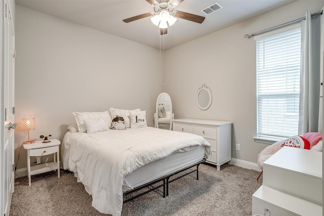 240 Gill Point Ln, Aledo, TX 76008 - bedroom with light colored carpet, multiple windows, baseboards, and ceiling fan