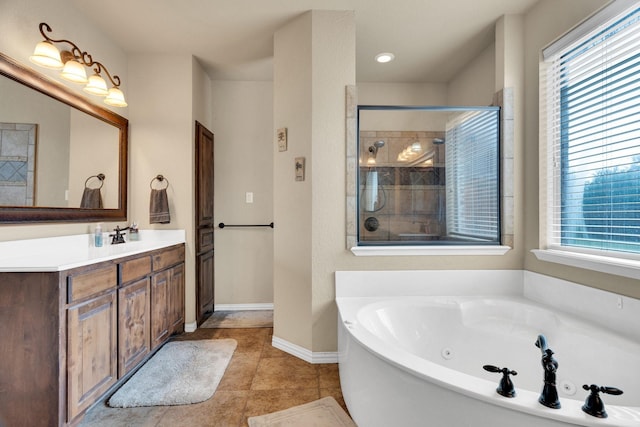 3630 Billy Ray Rd, Midlothian, TX 76065 - bathroom with a jetted tub, vanity, plenty of natural light, and tile patterned floors