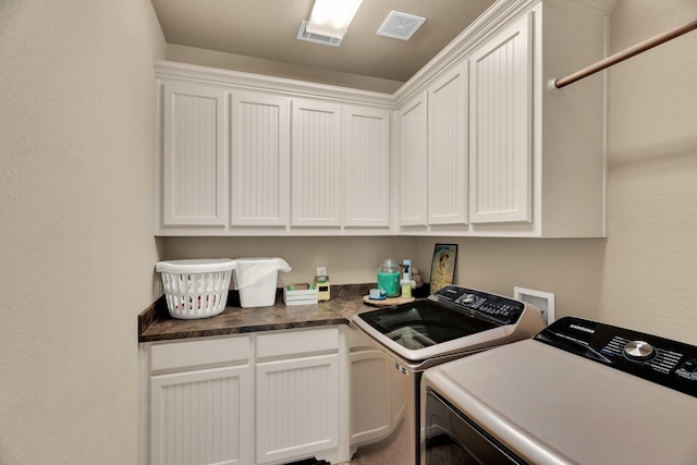 3630 Billy Ray Rd, Midlothian, TX 76065 - laundry area featuring washer and dryer and cabinet space