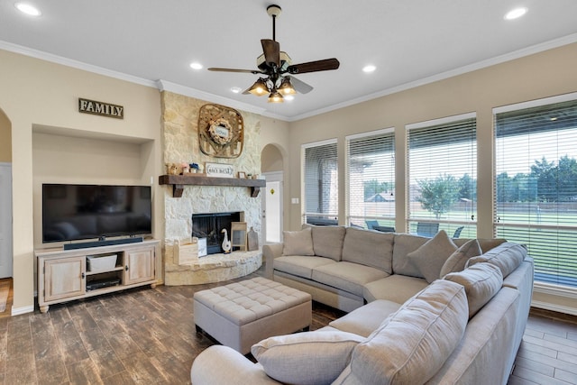 3630 Billy Ray Rd, Midlothian, TX 76065 - living room featuring arched walkways, a ceiling fan, dark wood finished floors, recessed lighting, and ornamental molding