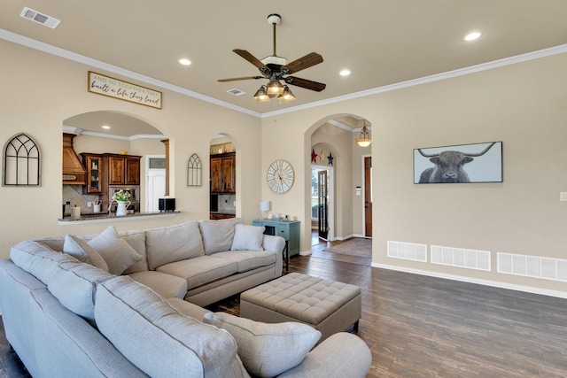 3630 Billy Ray Rd, Midlothian, TX 76065 - living area featuring arched walkways, dark wood-type flooring, recessed lighting, ceiling fan, and baseboards