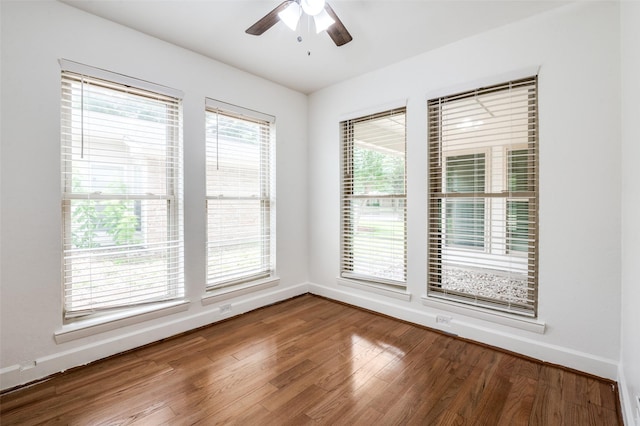 3113 E Park Blvd, Plano, TX 75074 - unfurnished room featuring baseboards, a ceiling fan, and wood finished floors