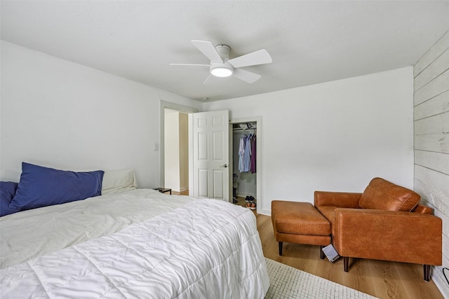 604 N Benge St, Mckinney, TX 75069 - bedroom with wood finished floors, a closet, and a ceiling fan