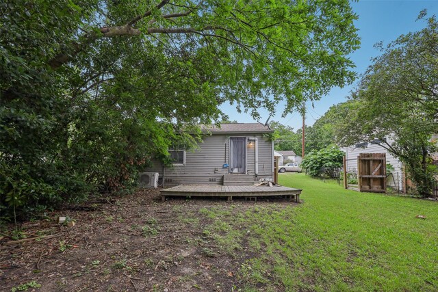 604 N Benge St, Mckinney, TX 75069 - view of green lawn featuring a deck and a cooling unit