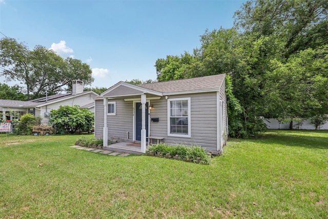 604 N Benge St, Mckinney, TX 75069 - view of front of home with a front yard and roof with shingles