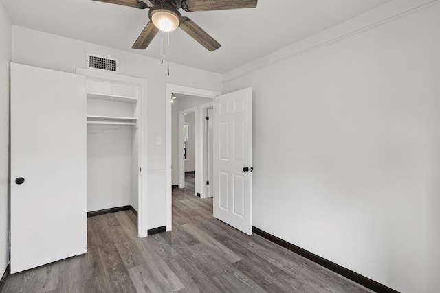 224 Brown Trl, Hurst, TX 76053 - unfurnished bedroom with wood finished floors, baseboards, and a closet