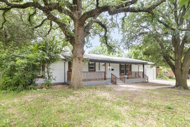 224 Brown Trl, Hurst, TX 76053 - single story home featuring a porch and a garage