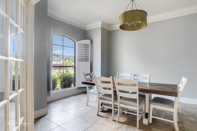 187 Waters Edge Dr, Shreveport, LA 71106 - dining area featuring healthy amount of natural light, crown molding, baseboards, and light tile patterned floors