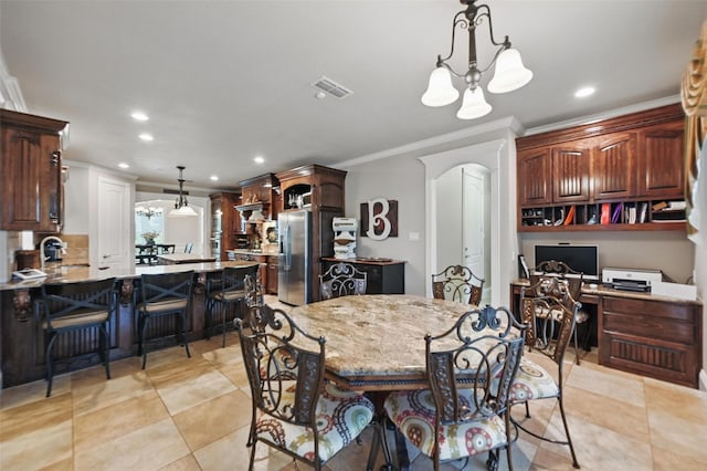175 Robnett Rd, Waxahachie, TX 75165 - dining area with crown molding, a chandelier, recessed lighting, a desk, and light tile patterned flooring