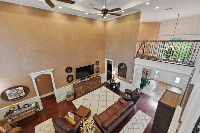 175 Robnett Rd, Waxahachie, TX 75165 - living area with a ceiling fan, wood finished floors, a high ceiling, recessed lighting, and a wainscoted wall