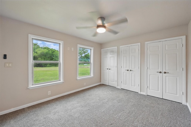 175 Robnett Rd, Waxahachie, TX 75165 - unfurnished bedroom featuring carpet flooring, baseboards, multiple closets, and ceiling fan