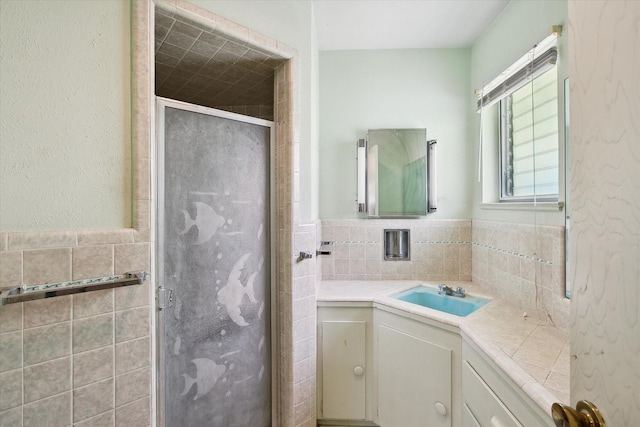 7200 Brooks Ave, Richland Hills, TX 76118 - full bathroom featuring tile walls, vanity, a shower stall, and wainscoting
