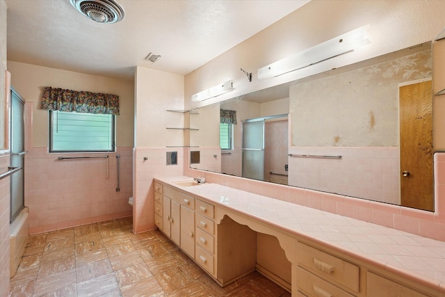 7200 Brooks Ave, Richland Hills, TX 76118 - bathroom with tile walls, toilet, vanity, and a wainscoted wall