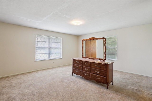 7200 Brooks Ave, Richland Hills, TX 76118 - bedroom featuring light carpet and baseboards