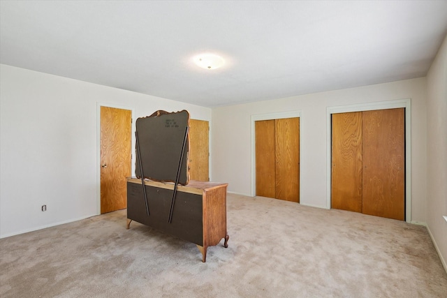 7200 Brooks Ave, Richland Hills, TX 76118 - bedroom with carpet floors and two closets