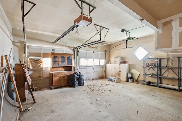 7200 Brooks Ave, Richland Hills, TX 76118 - garage featuring a garage door opener