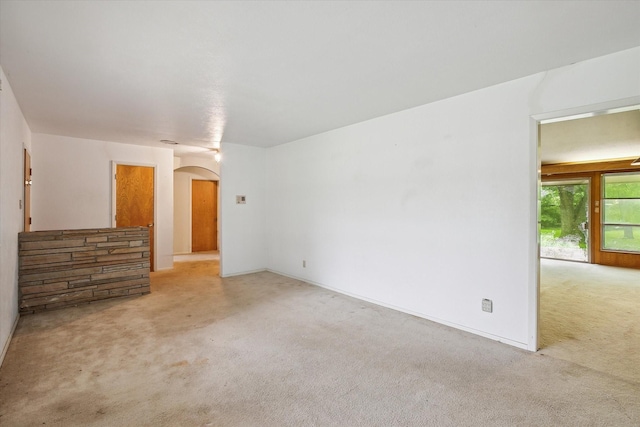 7200 Brooks Ave, Richland Hills, TX 76118 - unfurnished living room with arched walkways and carpet