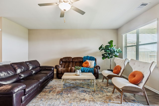 203 Lake Rdg, Princeton, TX 75407 - living room featuring wood finished floors, baseboards, and a ceiling fan