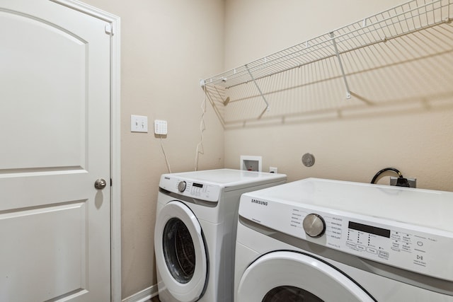 203 Lake Rdg, Princeton, TX 75407 - washroom with separate washer and dryer