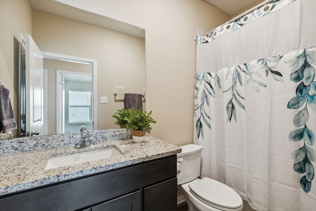 203 Lake Rdg, Princeton, TX 75407 - bathroom with vanity, toilet, and a shower with shower curtain