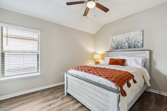 203 Lake Rdg, Princeton, TX 75407 - bedroom with wood finished floors, vaulted ceiling, baseboards, and a ceiling fan