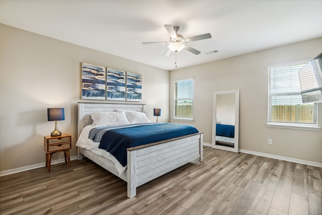 203 Lake Rdg, Princeton, TX 75407 - bedroom with light wood-style flooring, baseboards, and ceiling fan
